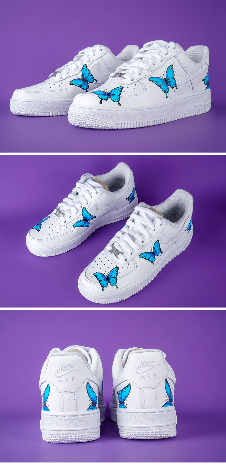 white nike shoes with blue butterflies